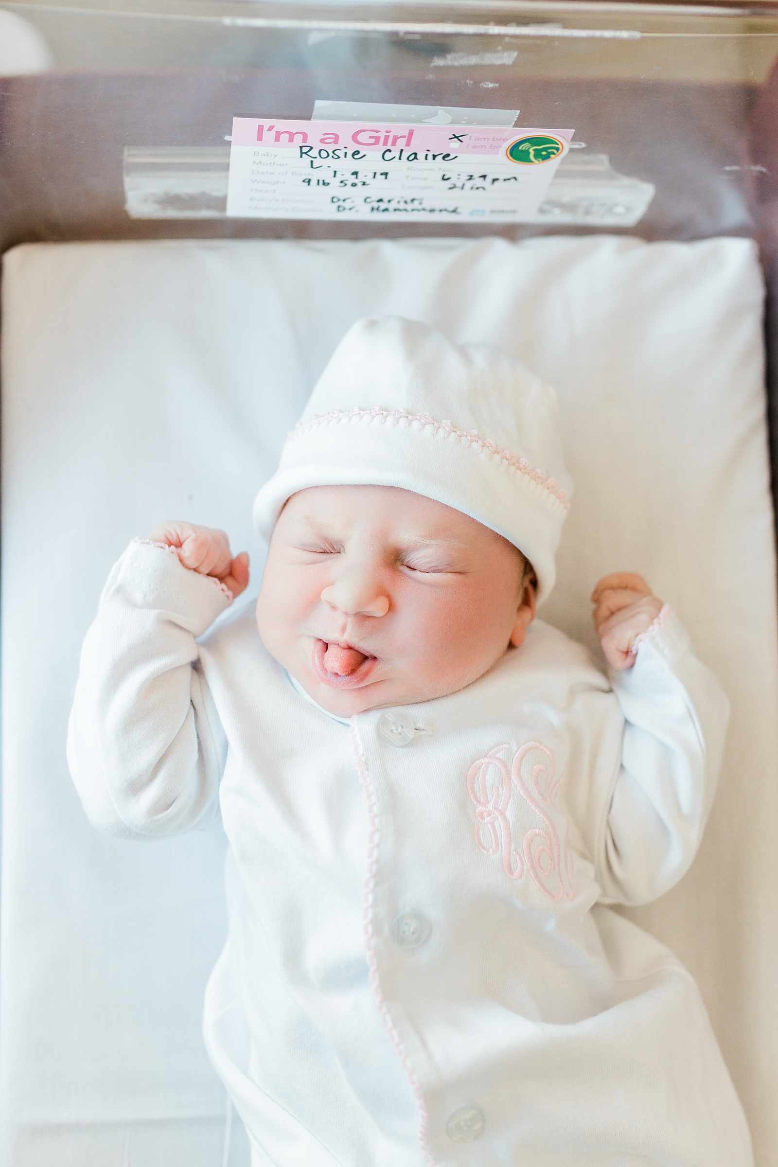 Baby girl in hospital bassinet by Charleston Fresh 48 photographer, Caitlyn Motycka Photography