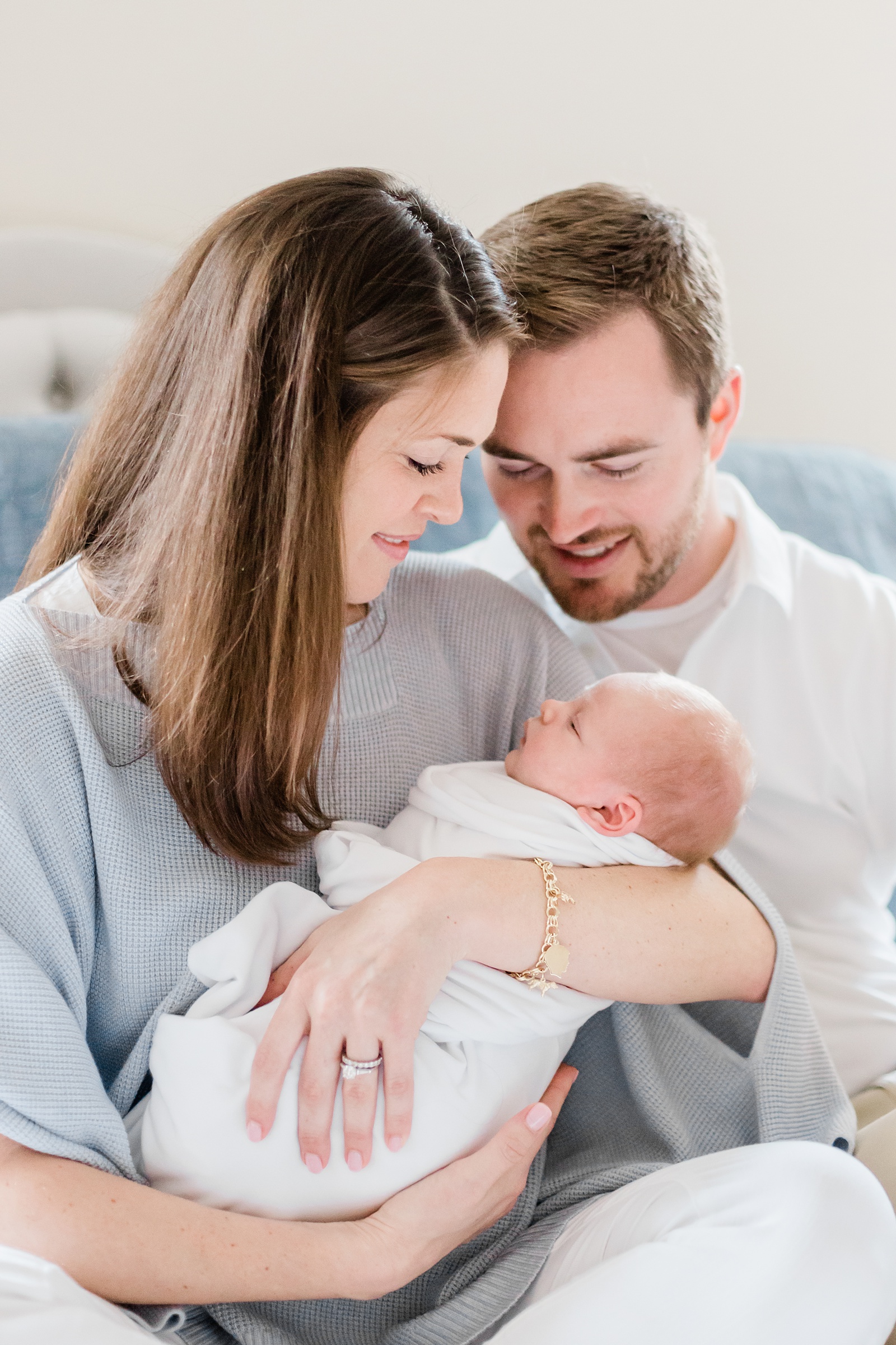 Baby swaddled during lifestyle newborn session in Mount Pleasant, SC | Caitlyn Motycka Photography