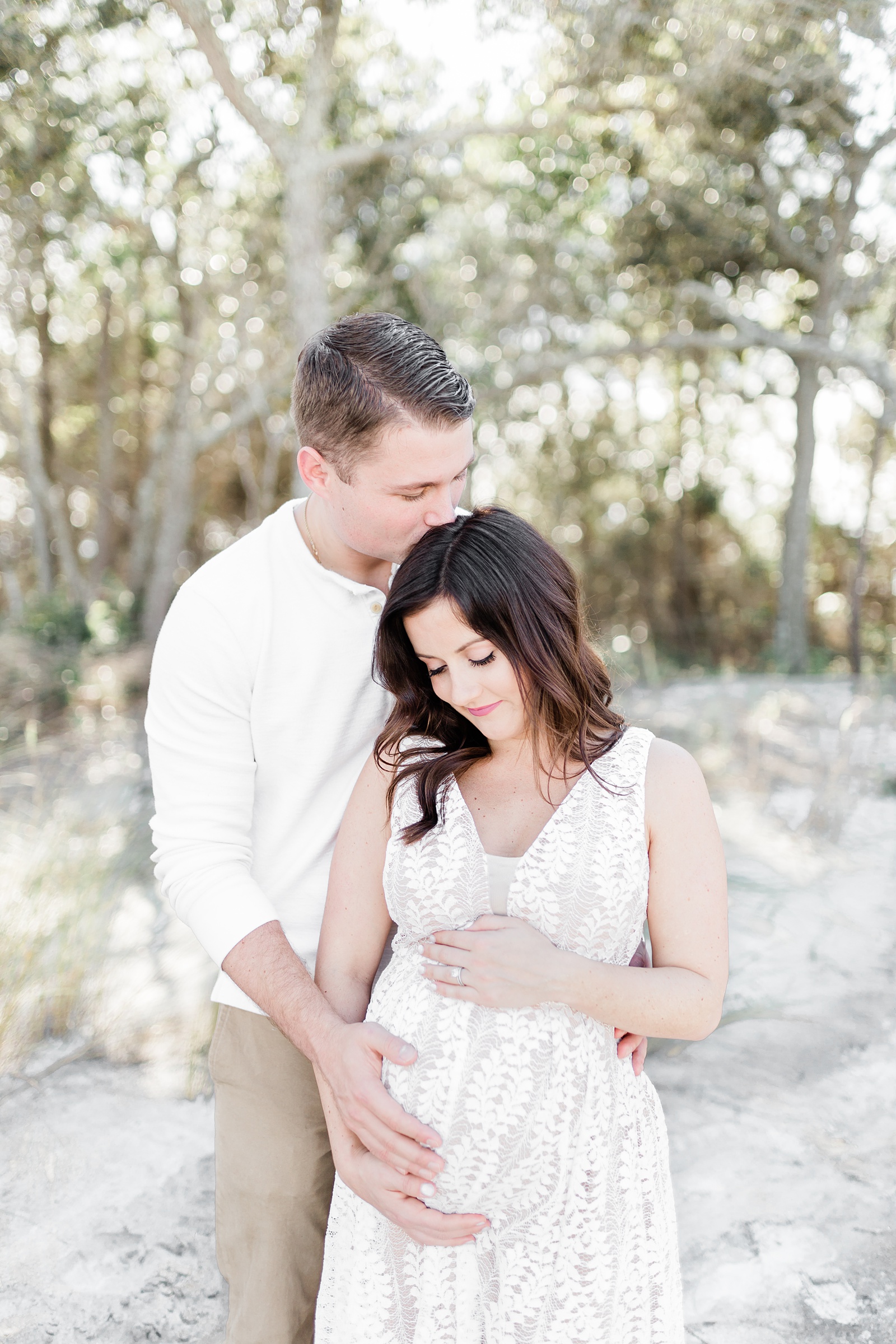 Couple in maternity session on Folly Beach, SC by Charleston Family and Maternity photographer, Caitlyn Motycka Photography