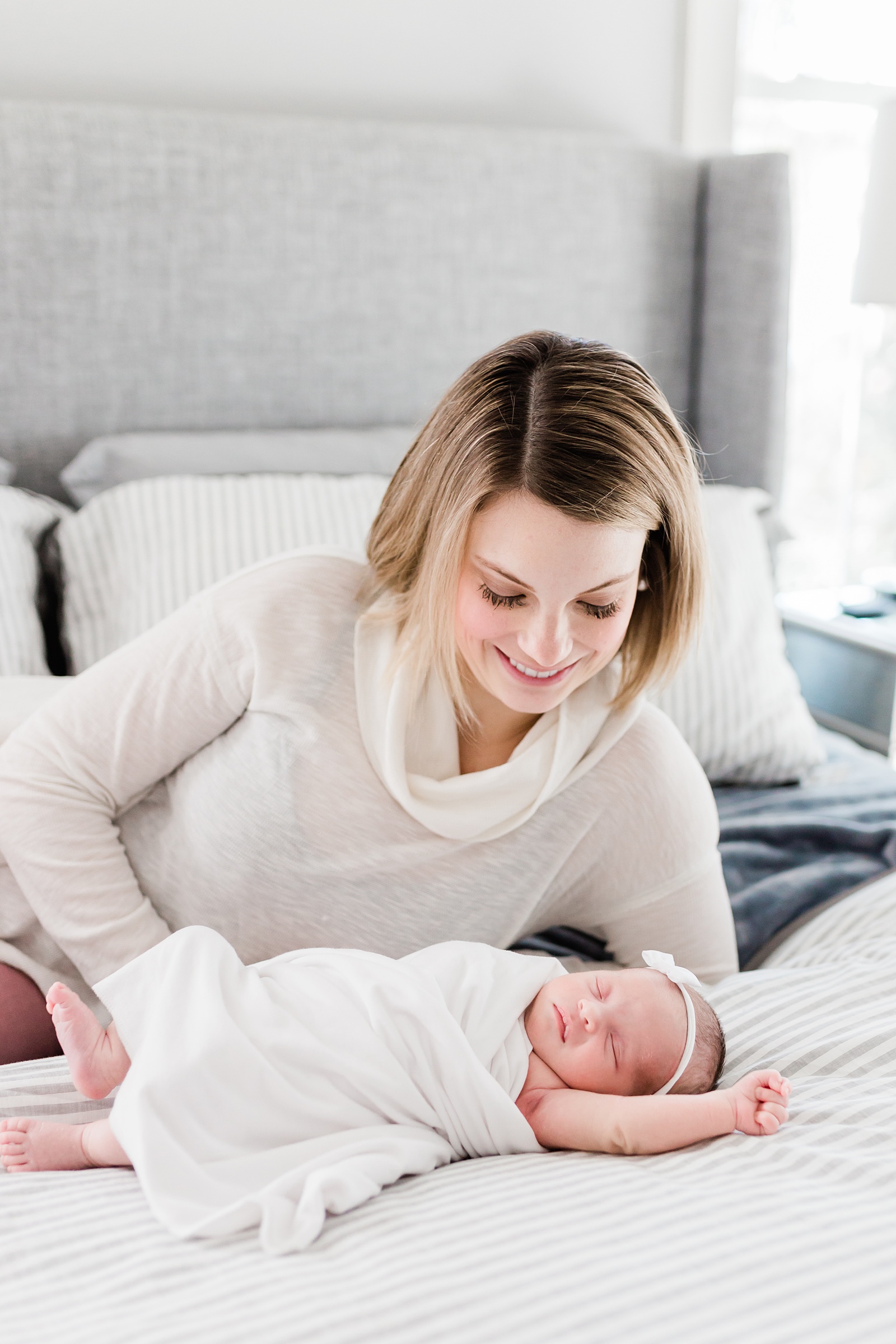 Beautiful mom with baby girl during newborn session in Charleston, SC | Caitlyn Motycka Photography