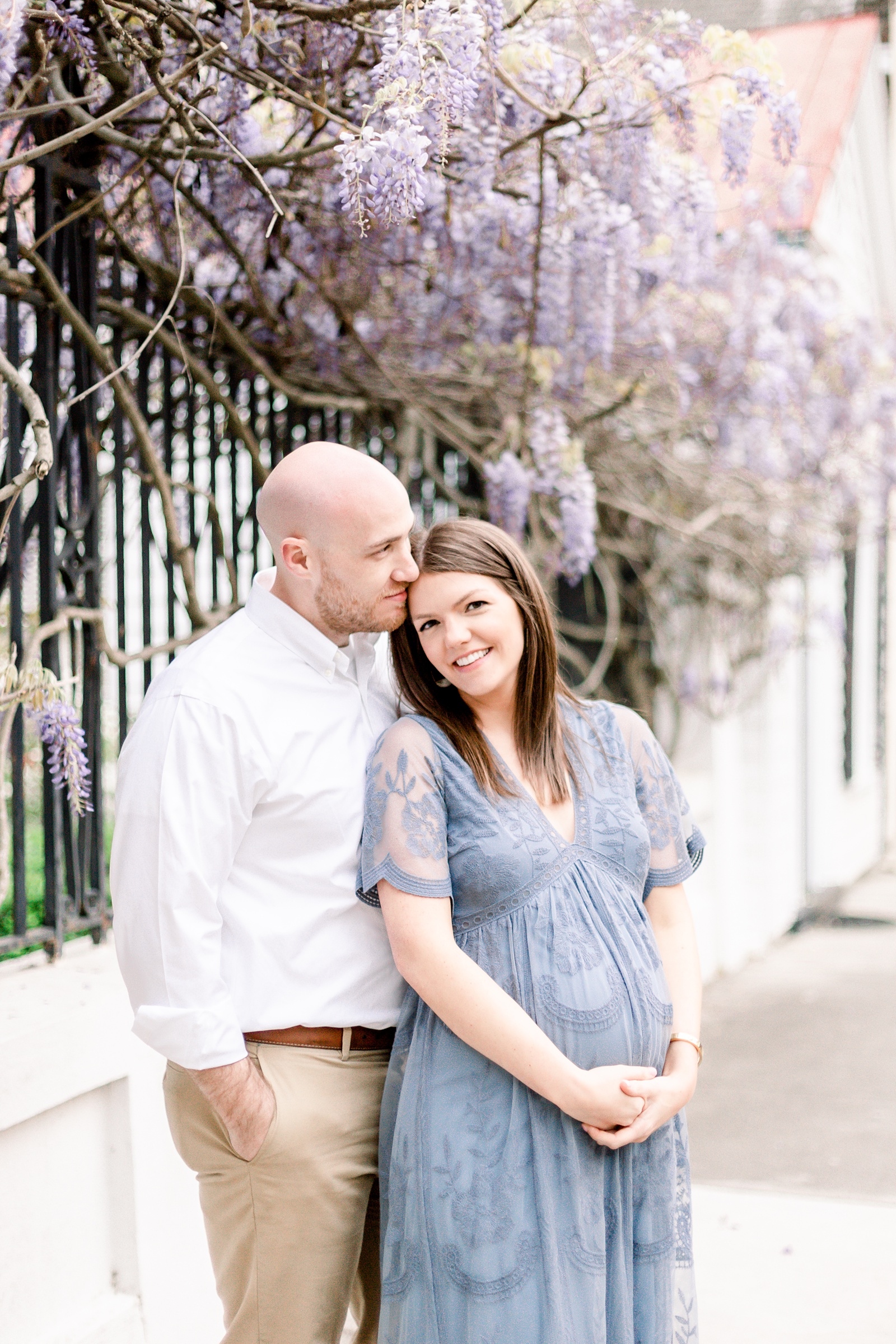 Spring maternity session among the wisteria in Charleston, SC by Charleston Maternity Photographer, Caitlyn Motycka Photography