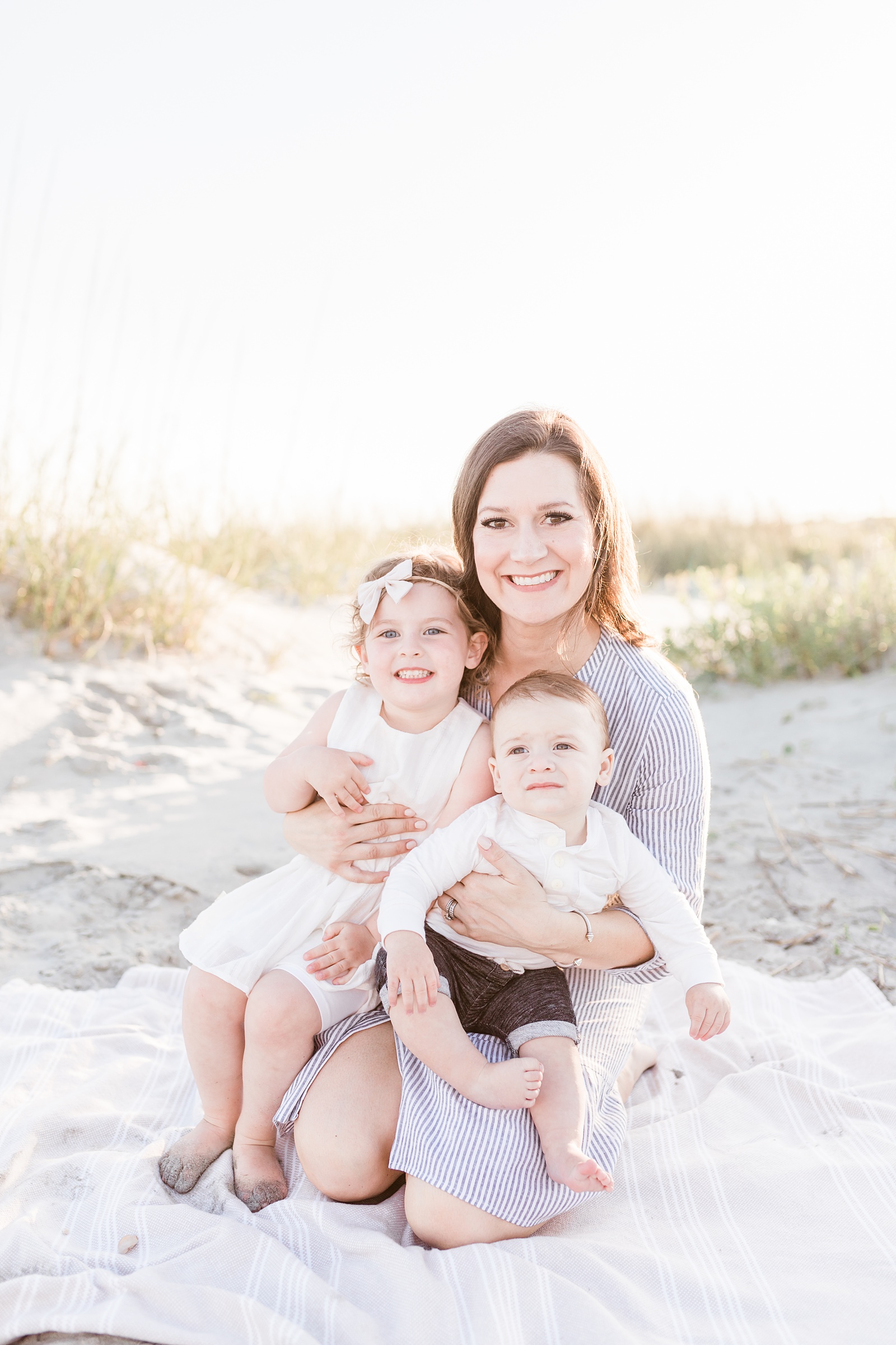 Mom and kids during beach family session on Isle of Palms by Charleston Family Photographer, Caitlyn Motycka Photography