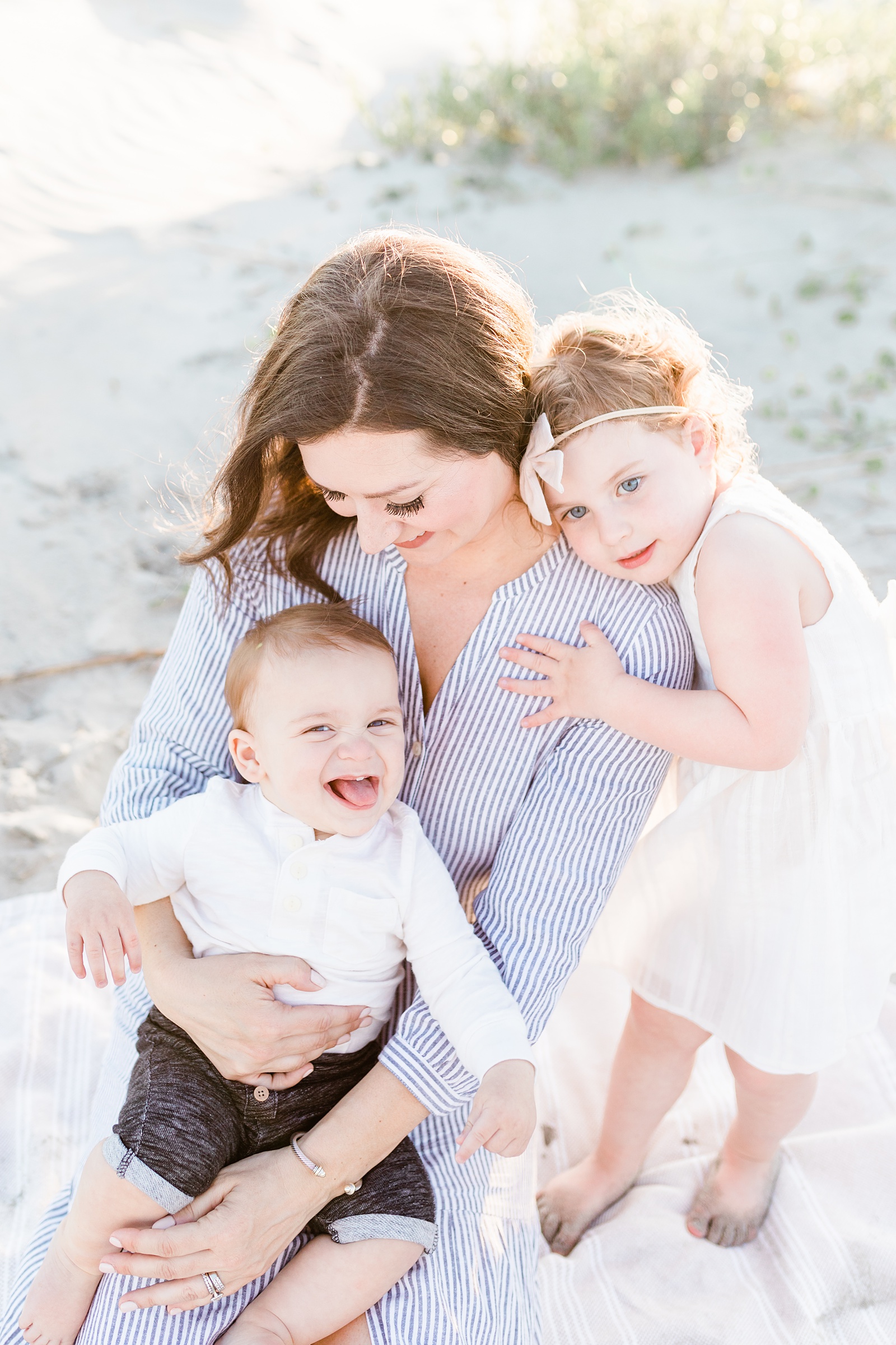 Mom and kids during beach family session outside of Charleston, SC | Caitlyn Motycka Photography