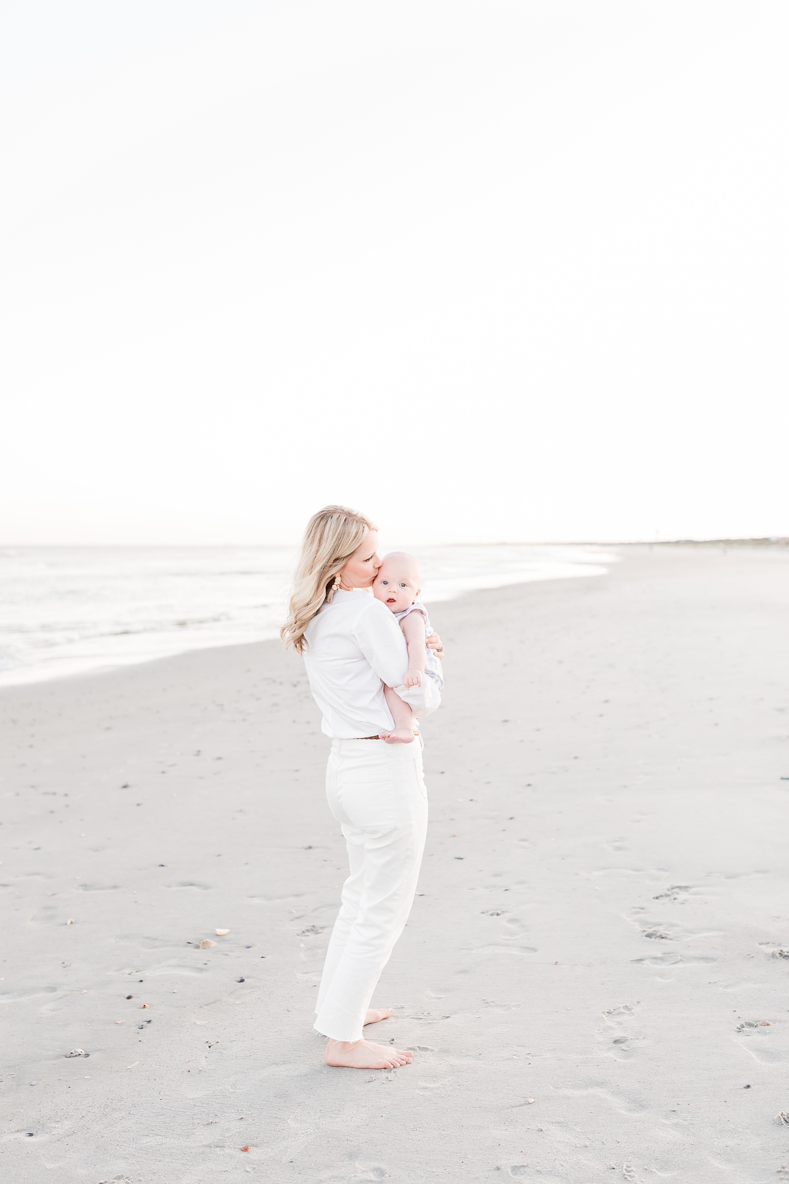 Mom and baby on Isle of Palms beach by Charleston Family Photographer, Caitlyn Motycka Photography