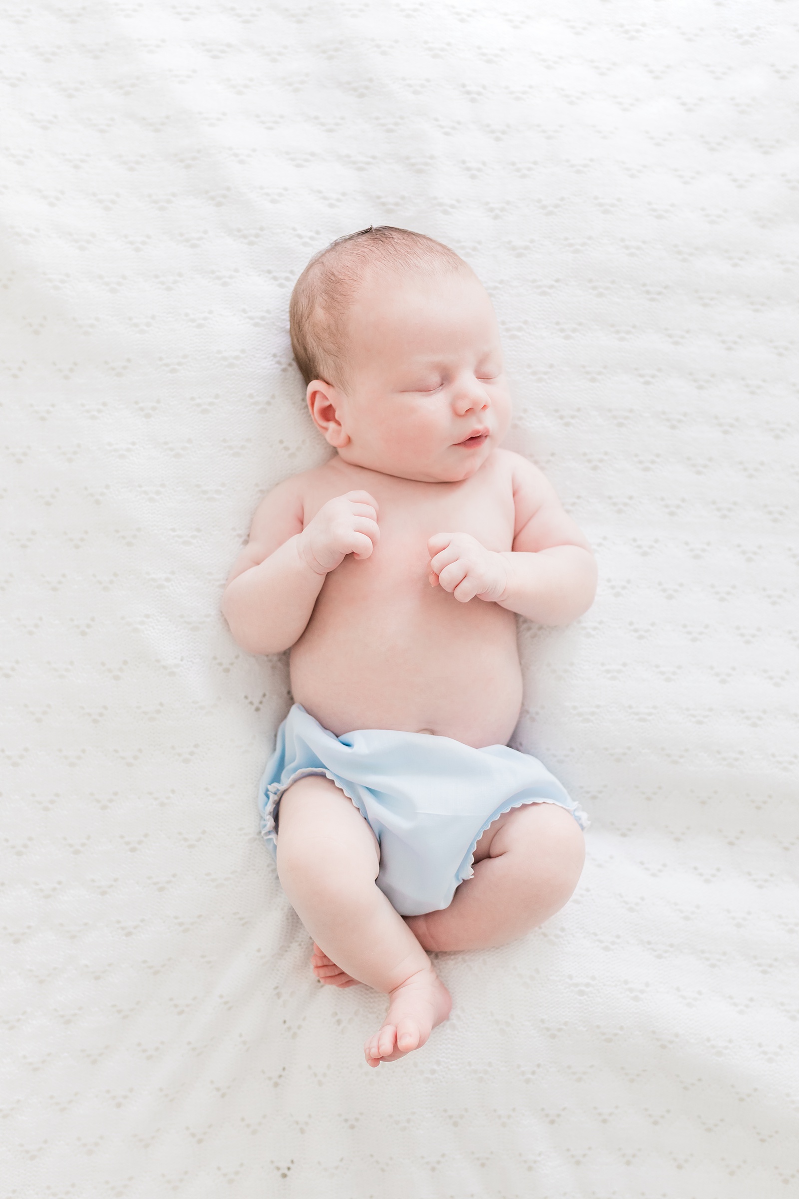 Baby in Feltman Brothers diaper cover by Caitlyn Motycka Photography