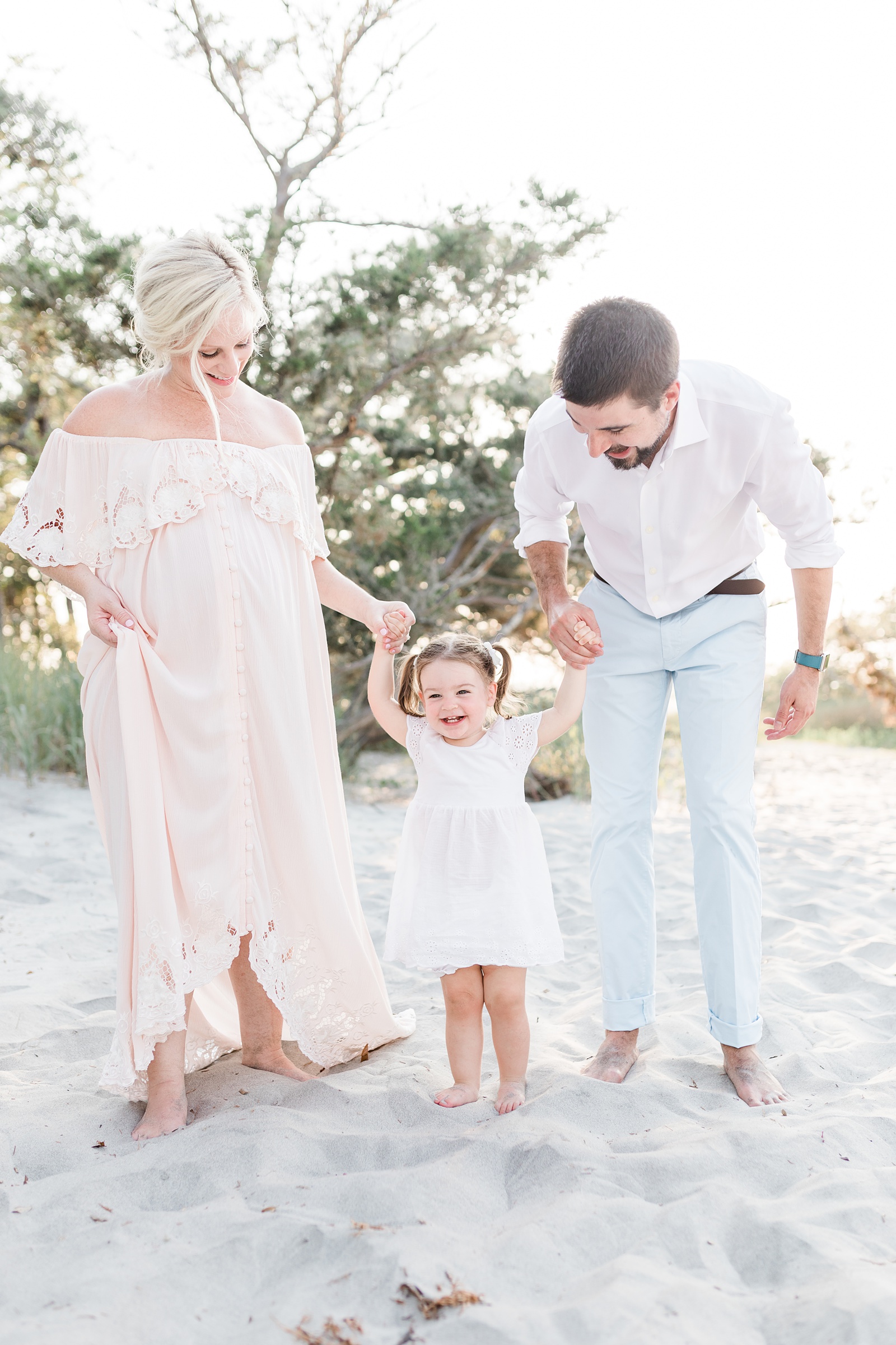 Maternity session with toddler and mom wearing Fillyboo dress by Caitlyn Motycka Photography