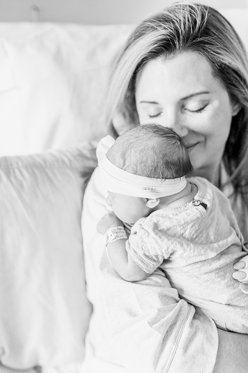 Hospital newborn photoshoot with baby girl. Photos by Charleston Fresh 48 Photographer, Caitlyn Motycka Photography.