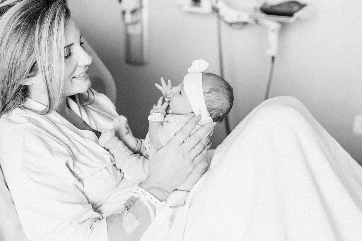 Hospital newborn photoshoot with baby girl. Photos by Charleston Fresh 48 Photographer, Caitlyn Motycka Photography.