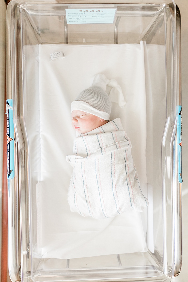 Baby in hospital bassinet for newborn photos with Charleston Fresh 48 Photographer, Caitlyn Motycka Photography.