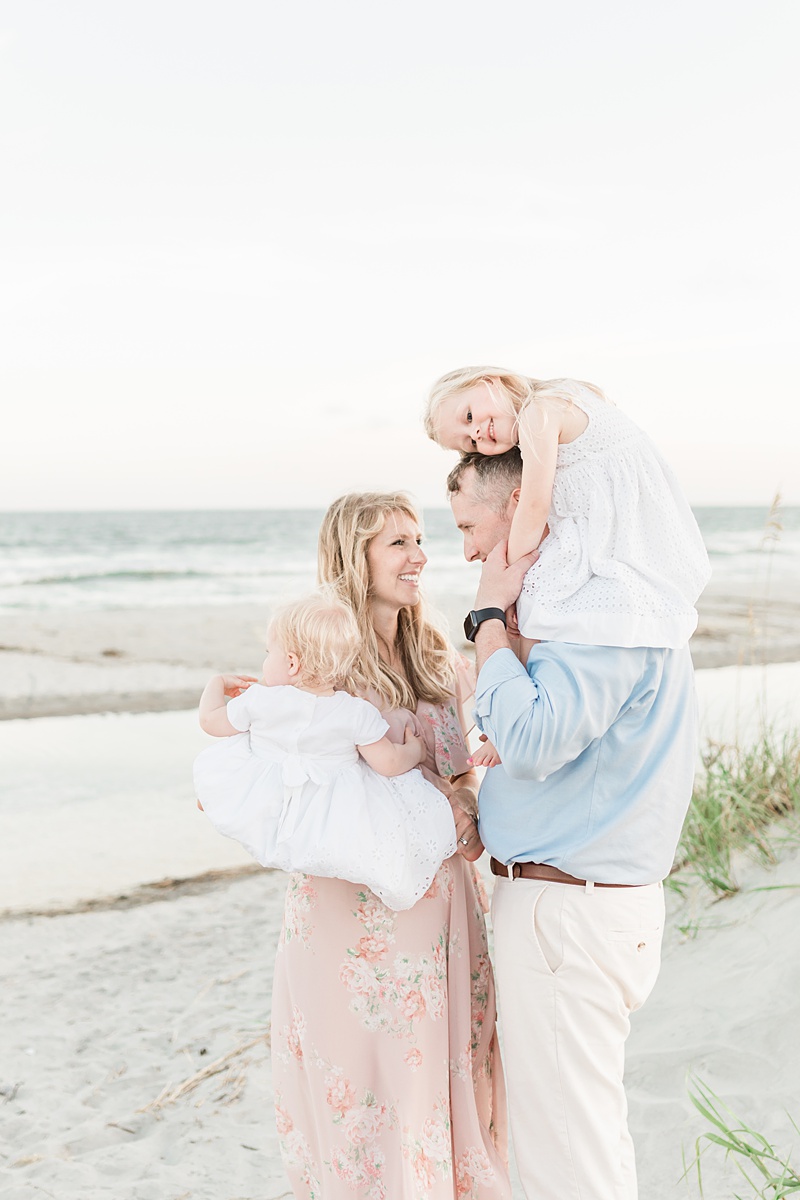 Beautiful light and airy family photo on Isle of Palms Beach with Charleston Family Photographer, Caitlyn Motycka Photography. 
