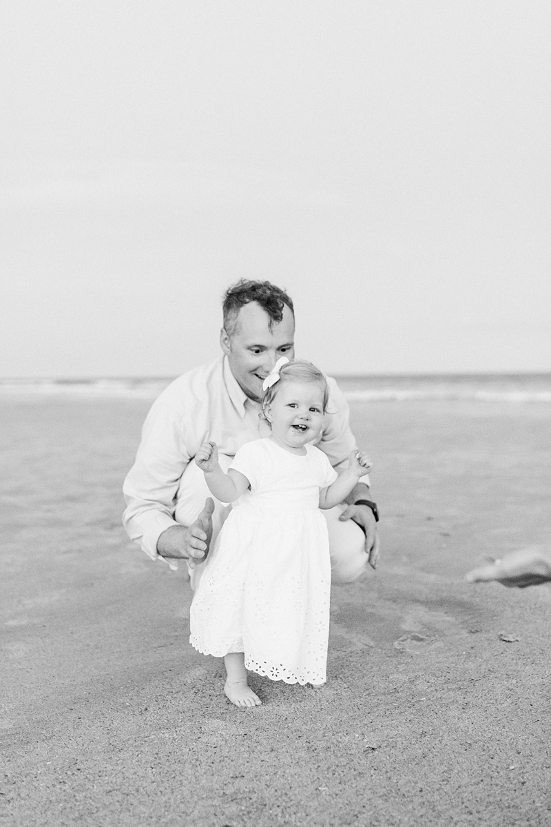 Black and white photos of father and daughter at Isle of Palms Beach in Charleston, SC | Caitlyn Motycka Photography 