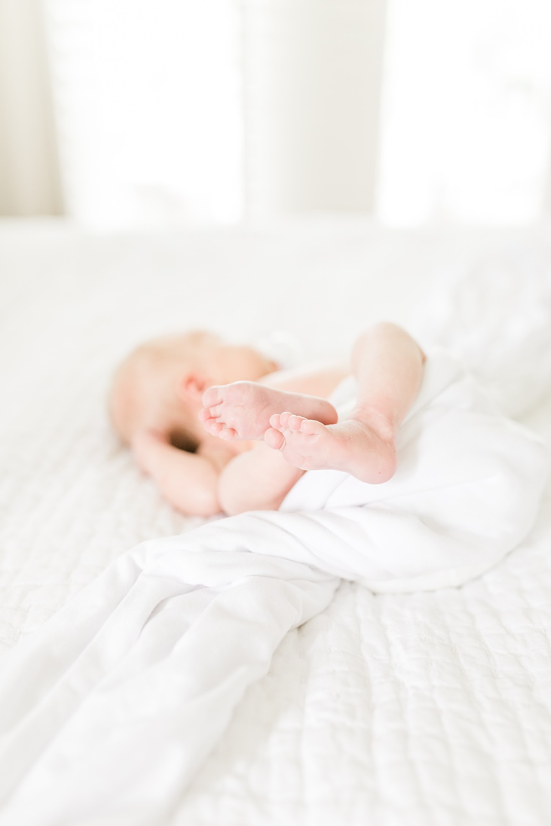 Baby details of toes during lifestyle newborn photoshoot | Caitlyn Motycka Photography