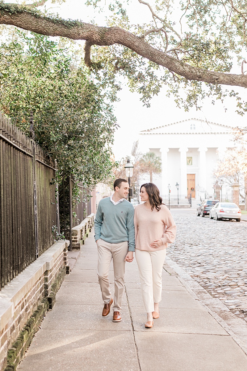 Downtown Charleston photoshoot to announce they are expecting their first baby! Photos by Charleston maternity and newborn photographer, Caitlyn Motycka Photography. 