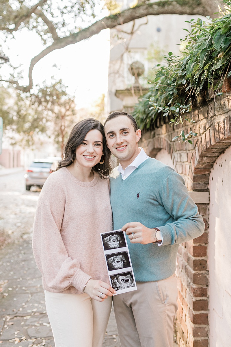 Pregnancy announcement in downtown Charleston, SC | Caitlyn Motycka Photography