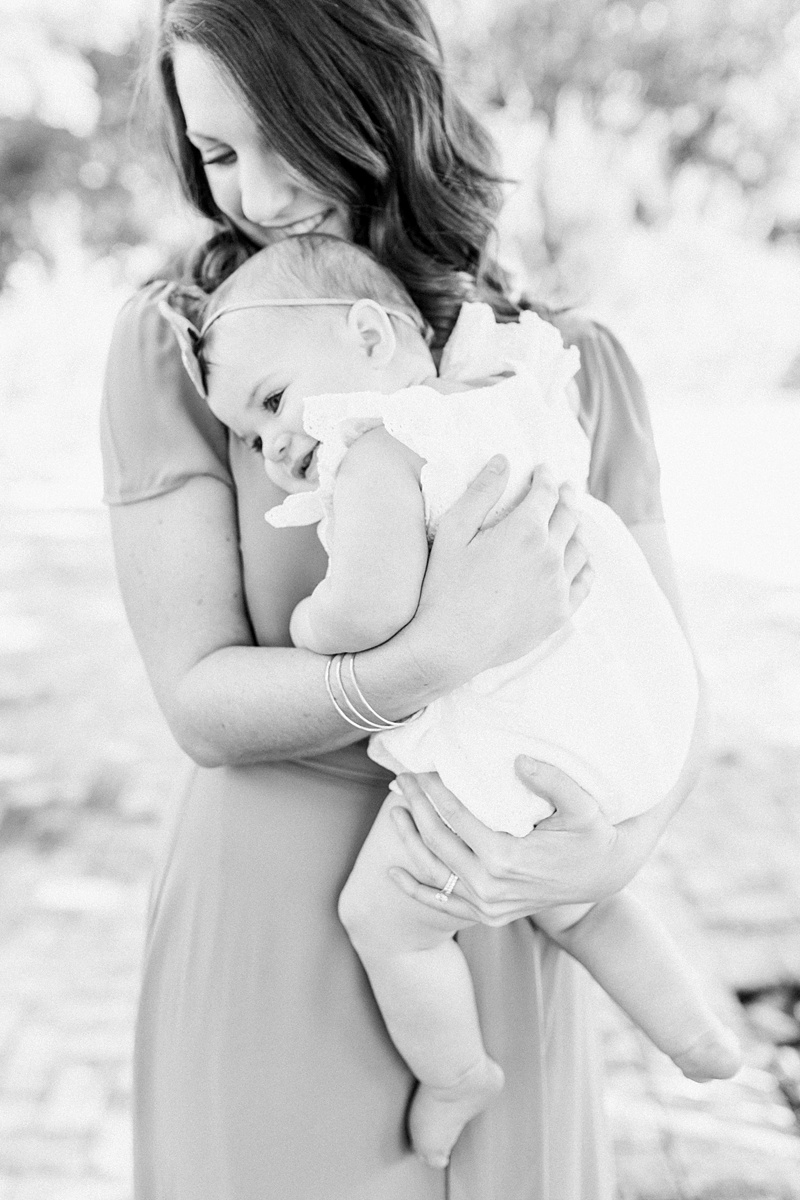 Black and white portrait of a sweet baby girl and her Mama. Photos by Motherhood Photographer, Caitlyn Motycka Photography. 