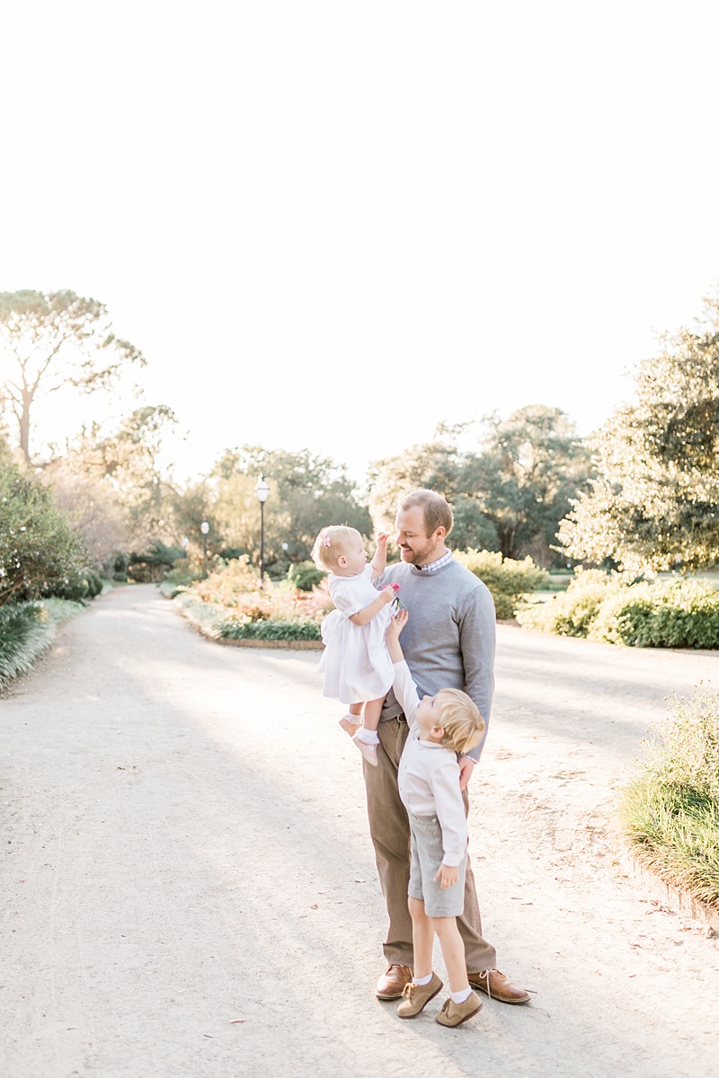 Father and two kids playing during family session | Caitlyn Motycka Photography