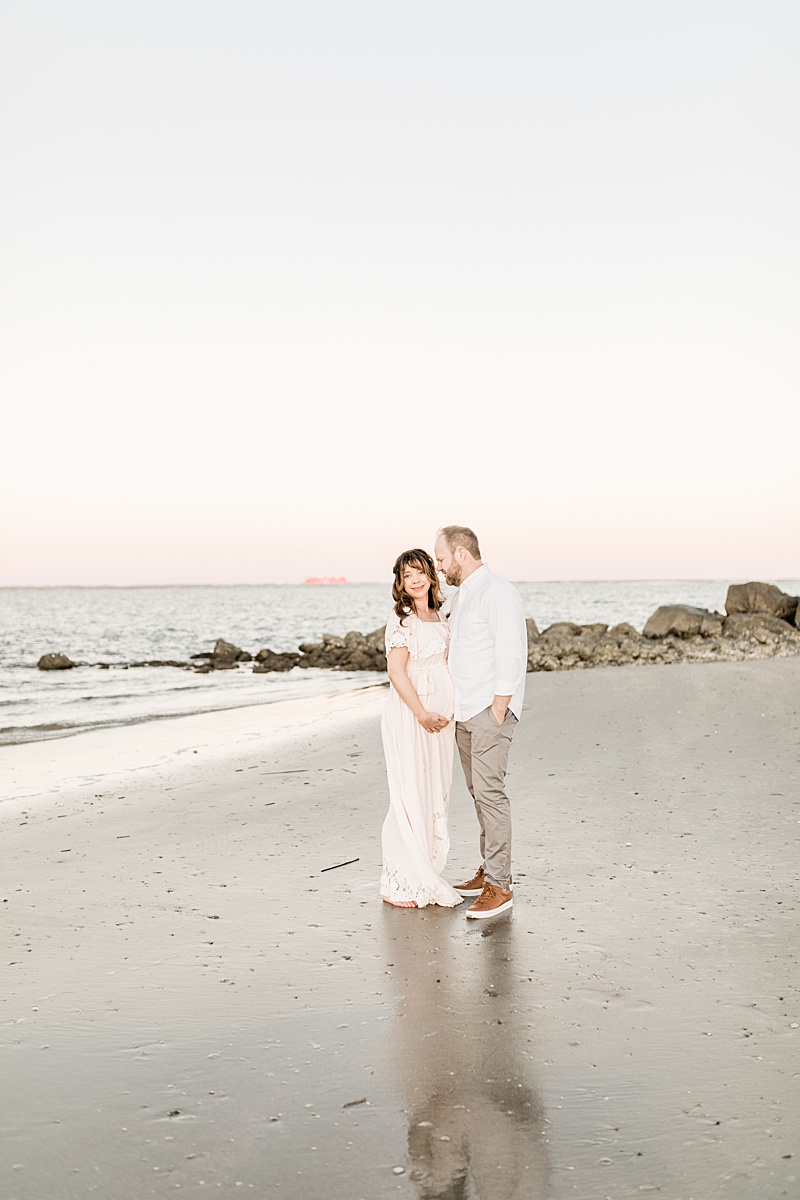 Sunset maternity photos on the beach with Charleston Photographer, Caitlyn Motycka Photography. 