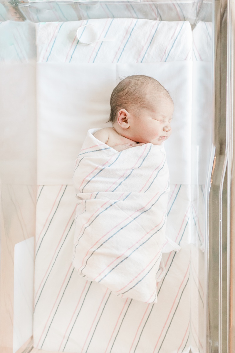 Baby swaddled in hospital bassinet. Photos by Charleston Fresh 48 Photographer, Caitlyn Motycka Photography.