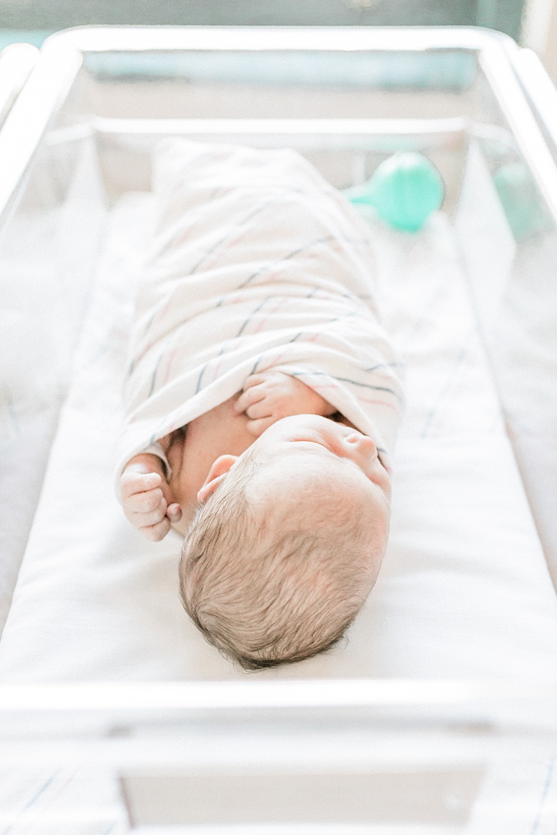 Hospital newborn photos with baby in hospital bassinet. Photos by Charleston Fresh 48 Photographer, Caitlyn Motycka Photography.
