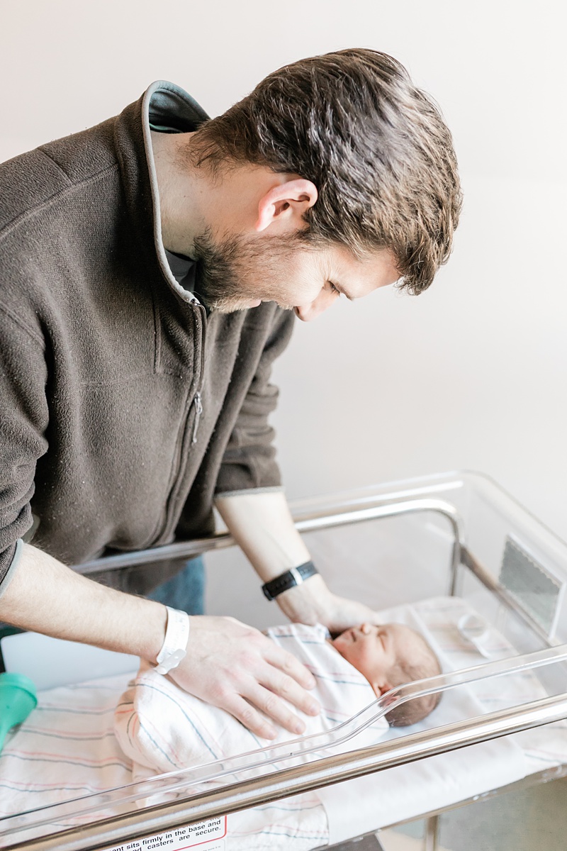 Father and son during hospital newborn photoshoot. Photos by Charleston Fresh 48 Photographer, Caitlyn Motycka Photography.