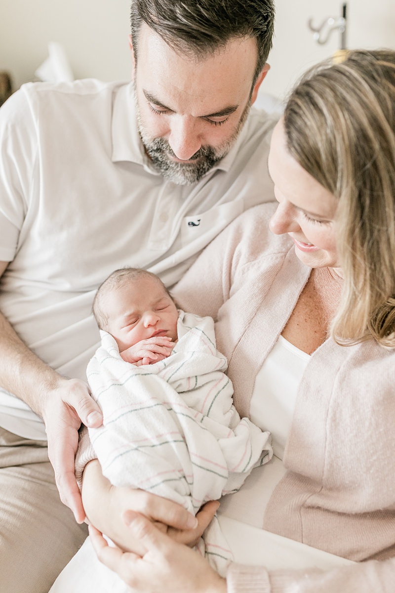 Mama and Daddy with baby girl during Fresh 48 photoshoot. Photos by Charleston Newborn Photographer, Caitlyn Motycka Photography.