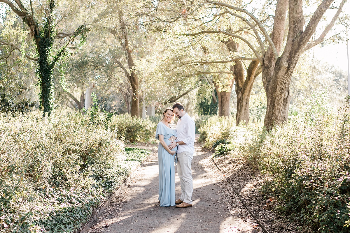 Couple celebrates pregnancy with maternity photoshoot with Charleston Maternity, Newborn & Family Photographer, Caitlyn Motycka Photography.
