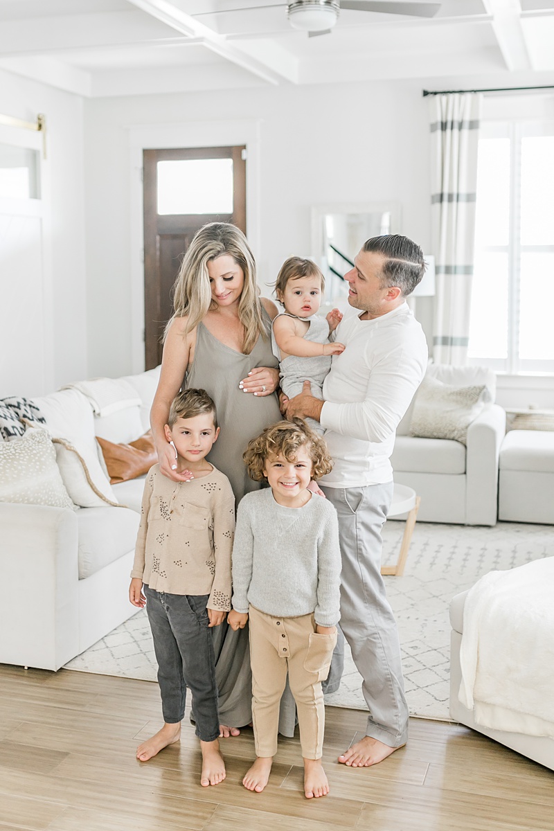 Family of five during in-home lifestyle maternity session by Charleston Maternity Photographer, Caitlyn Motycka Photography
