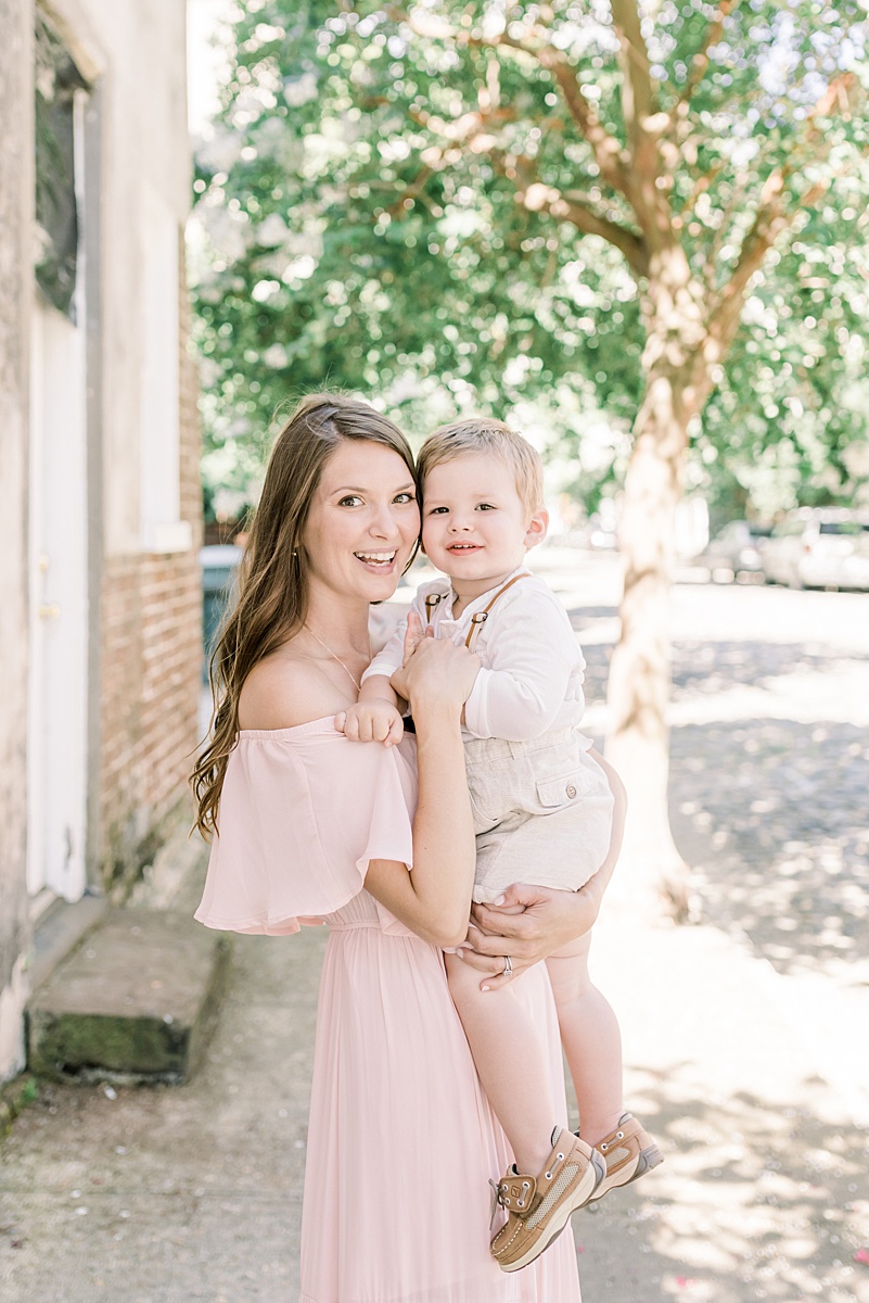 Photo of Mama + toddler son in Downtown Charleston. Photos by Charleston Family Photographer, Caitlyn Motycka Photography.