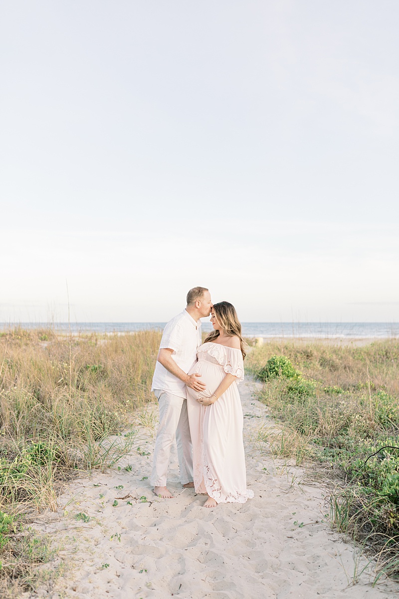 Maternity photos in the dunes at Isle of Palms in Charleston, SC | Caitlyn Motycka Photography