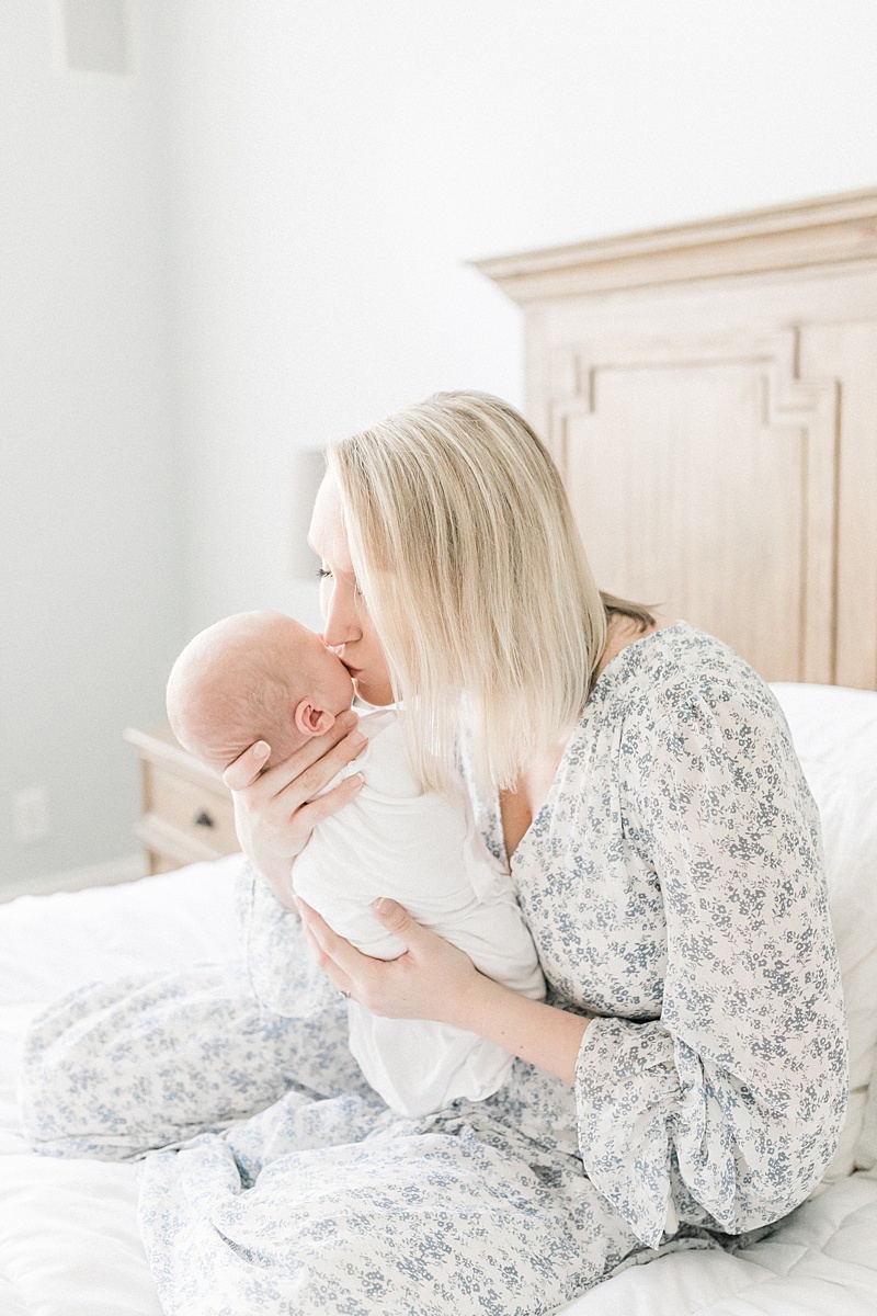 Lifestyle newborn session in beautiful Mount Pleasant home. Photos by Newborn Photographer, Caitlyn Motycka Photography. 