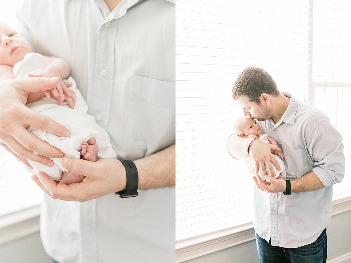 Daddy and baby during lifestyle newborn session in Mount Pleasant. Photos by Caitlyn Motycka Photography. 