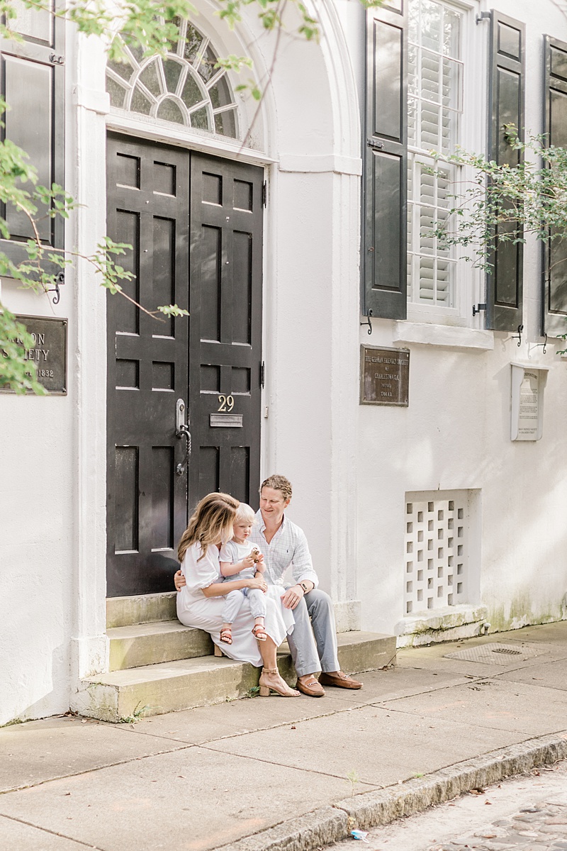 Family on front porch stoop in Downtown Charleston | Caitlyn Motycka Photography