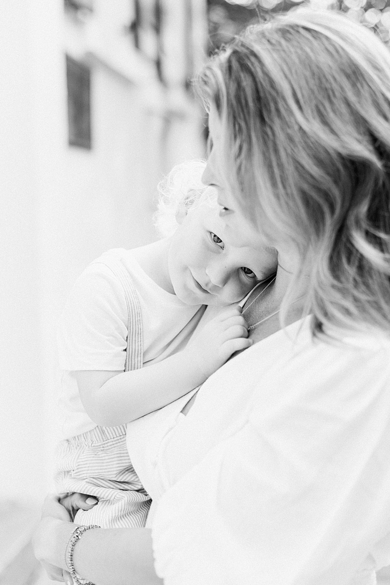 Sweet moment between toddler and his Mama in black and white. Photos by Charleston Family Photographer, Caitlyn Motycka Photography. 