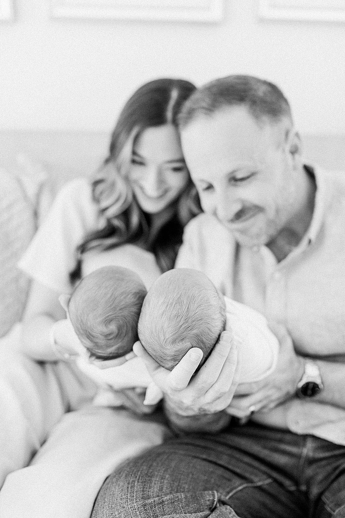 Black and white lifestyle newborn photo. Photos by Caitlyn Motycka Photography.