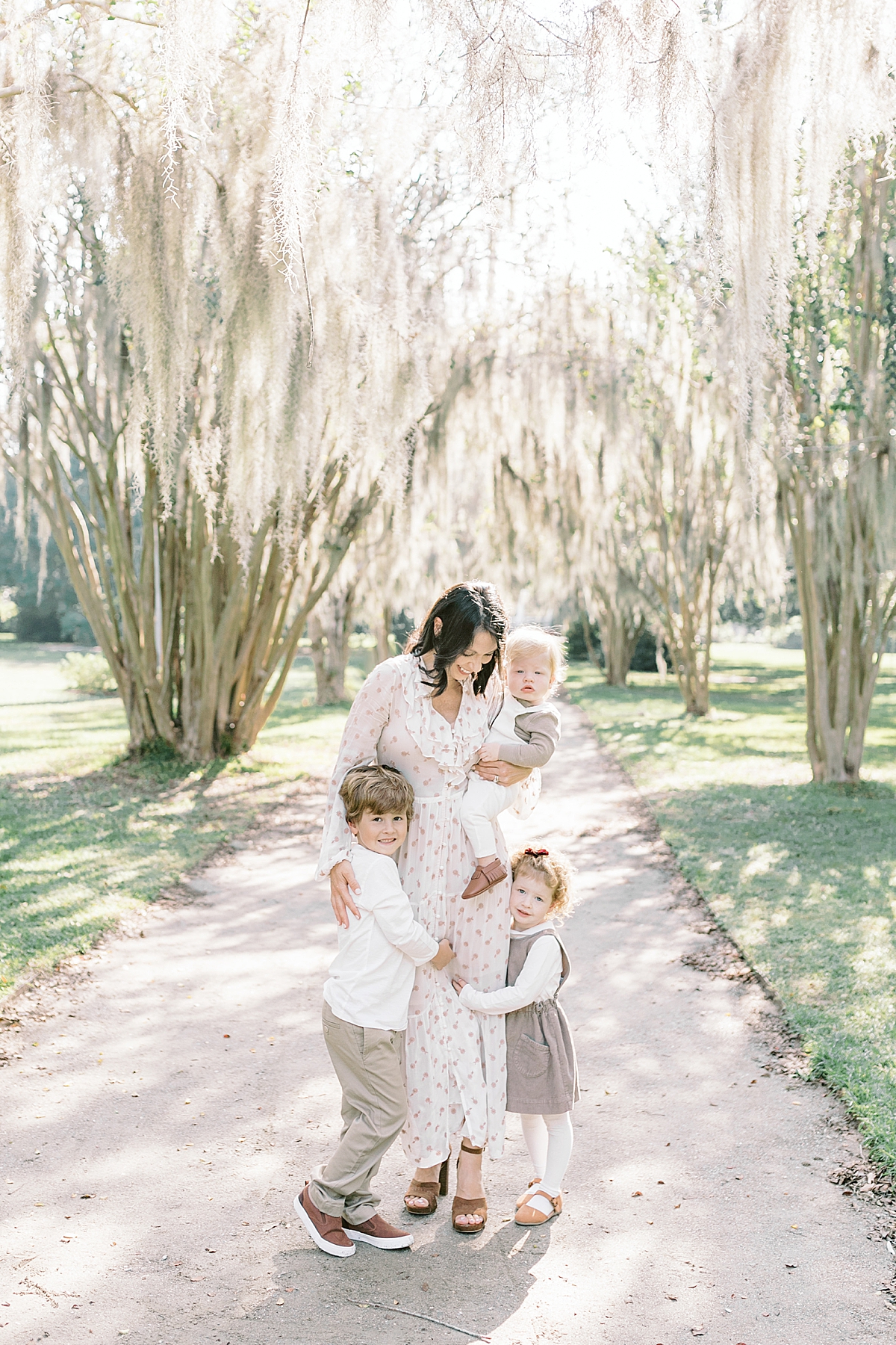 Mama and her three children. Photos by Family Photographer, Caitlyn Motycka Photography. 