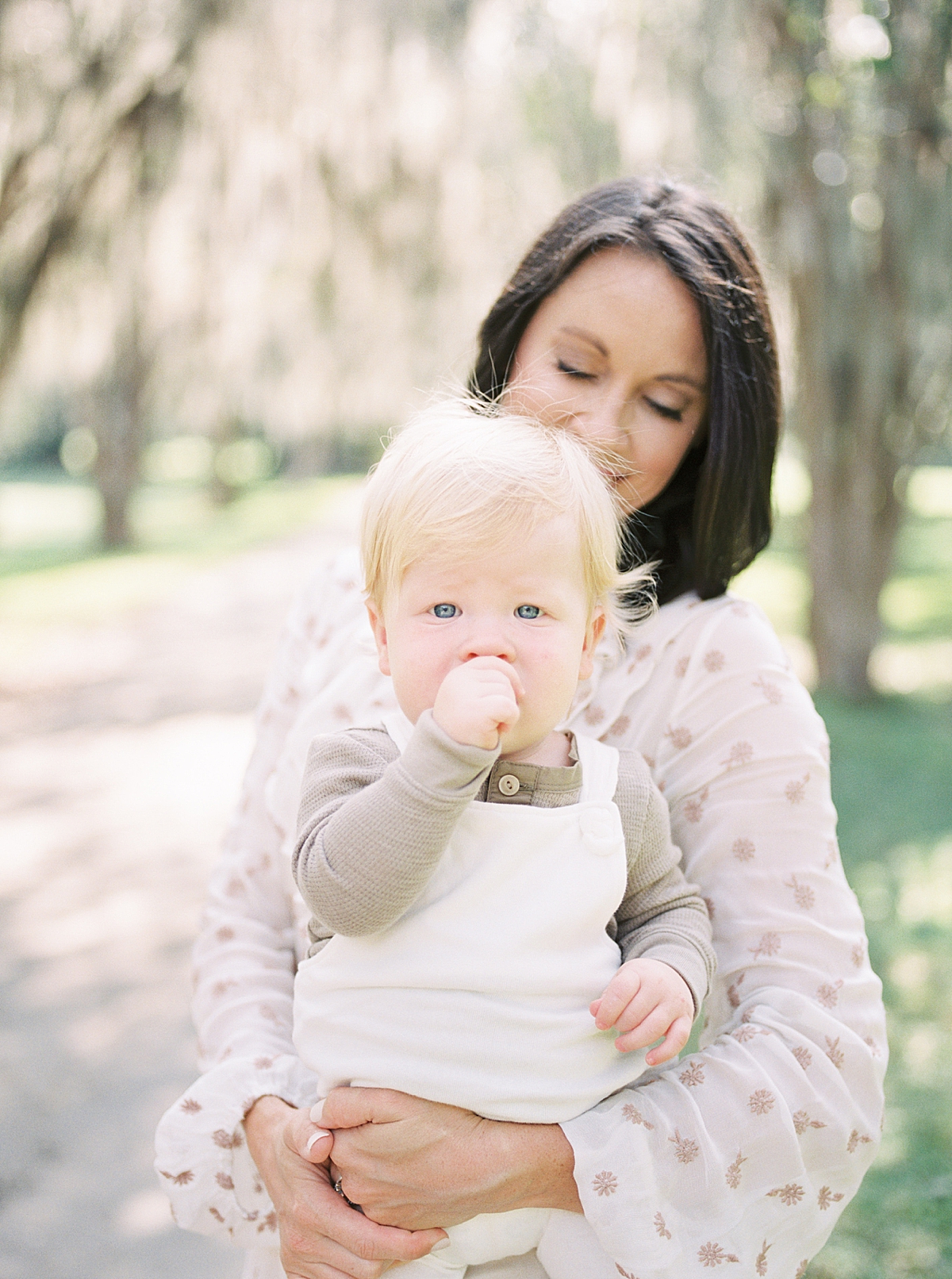 Film photo of Mom and son and his first birthday photoshoot. Photos by Caitlyn Motycka Photography.