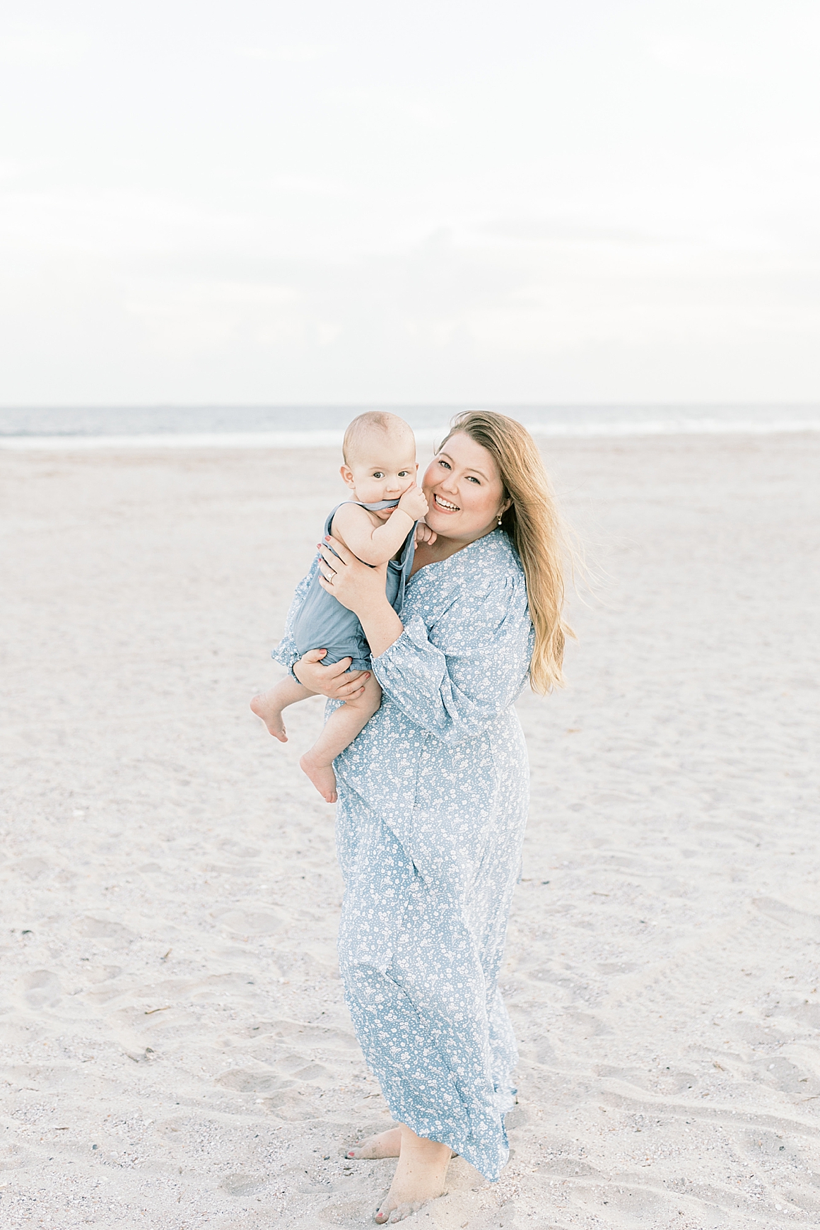 Mom with one year old son on Isle of Palms. Photos by Caitlyn Motycka Photography.