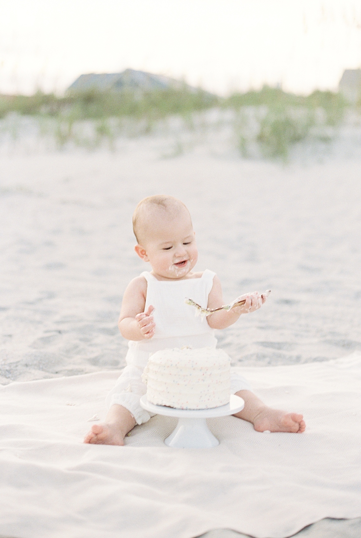 Cake smash on the beach to celebrate turning one! Photos by Isle of Palms Photographer, Caitlyn Motycka Photography.
