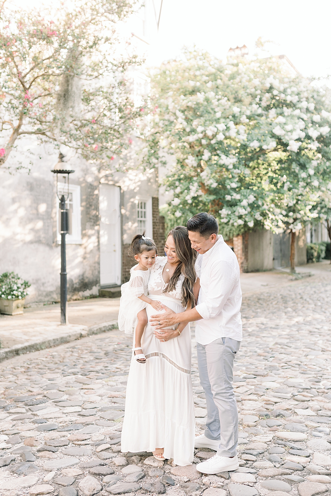 Maternity session in Downtown Charleston on the cobblestone streets. Photos by Caitlyn Motycka Photography.