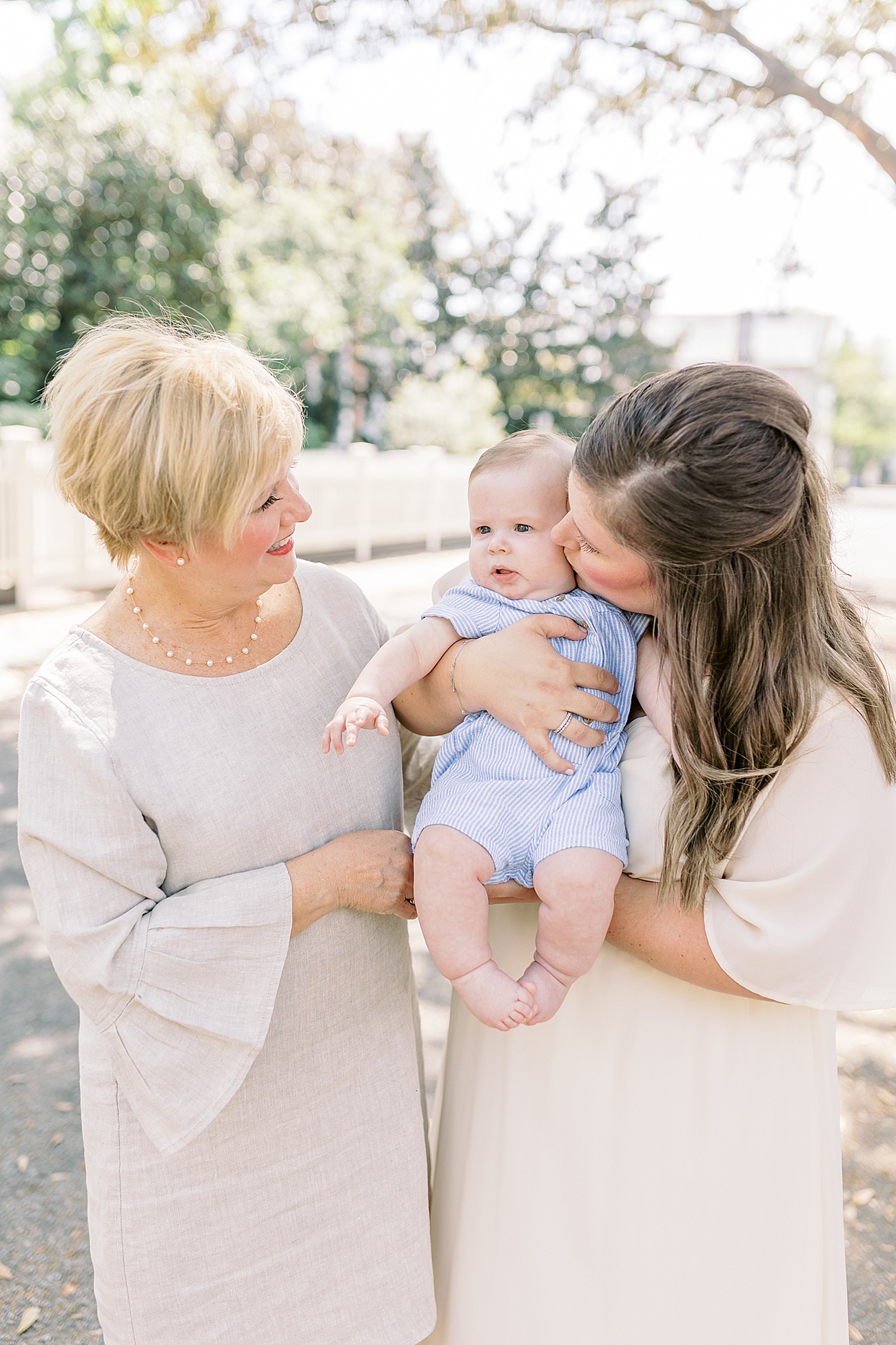 Three generations in photo in downtown Charleston by Caitlyn Motycka Photography.