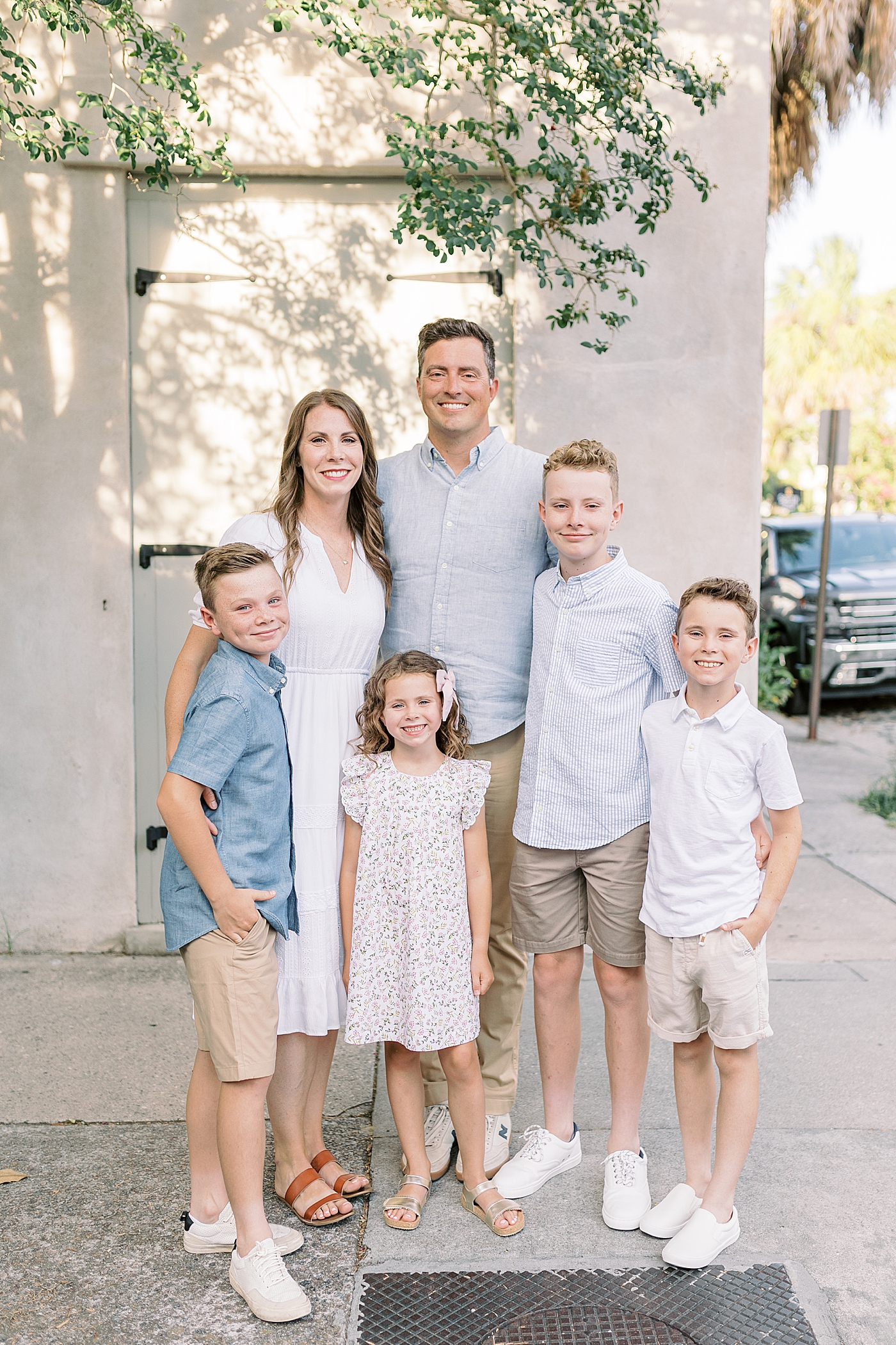 Family of six during photos in downtown Charleston | Photo by Caitlyn Motycka Photography