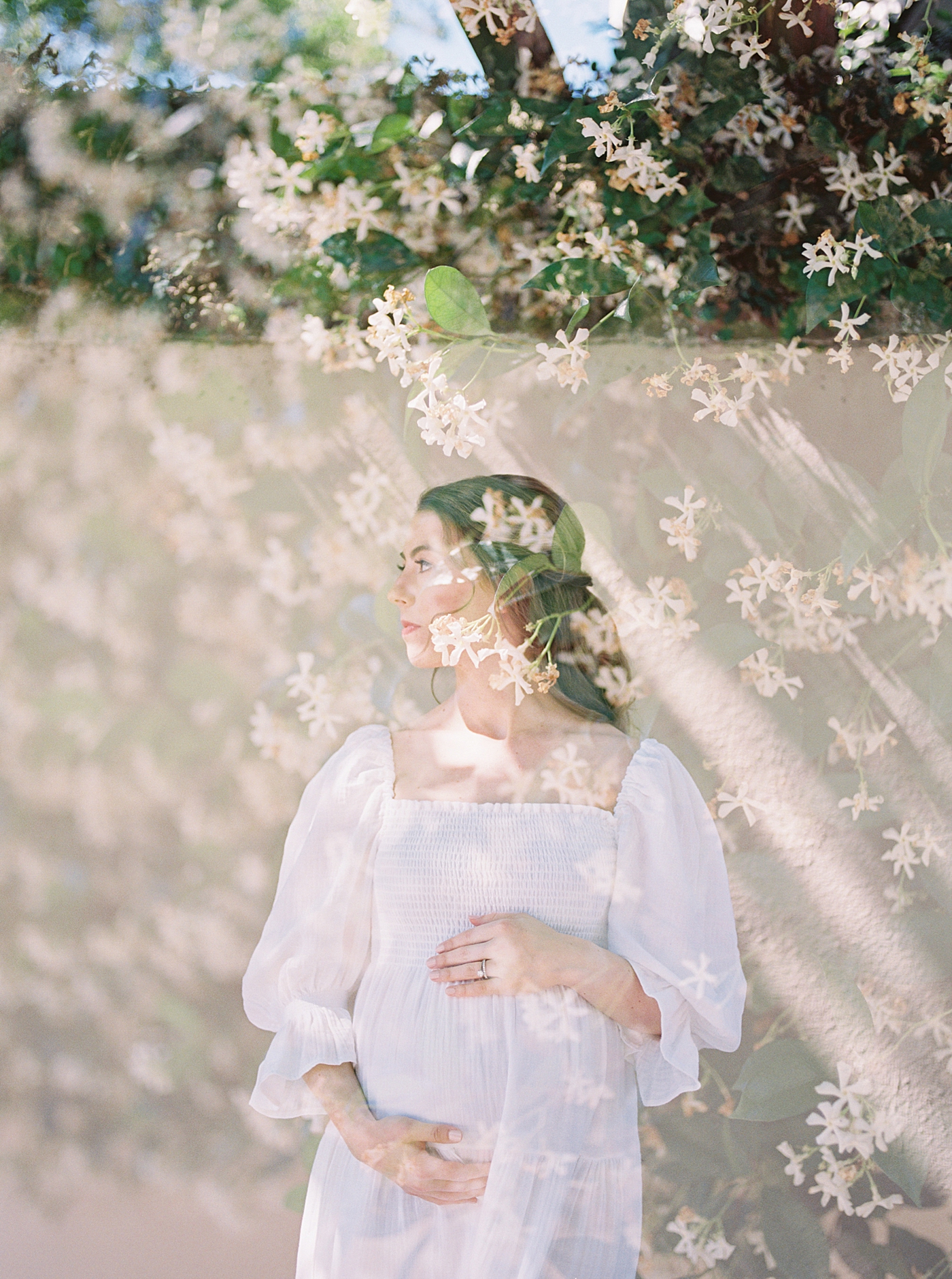 Double exposure of mom to be and flowers | Photo by Charleston Film Photographer Caitlyn Motycka