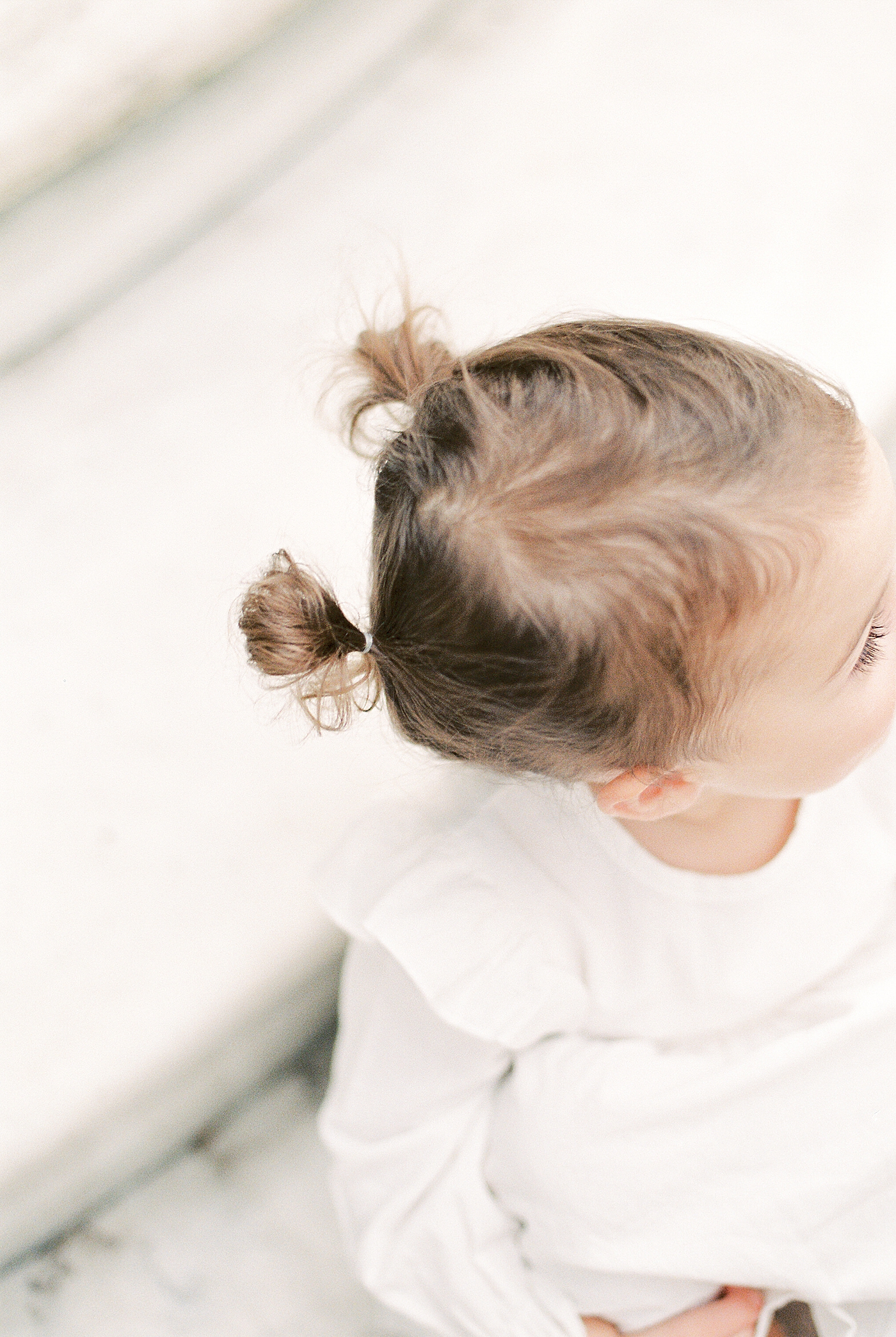 Toddle girls pigtails during Fall Family Mini Session | Photo by Caitlyn Motycka Photography
