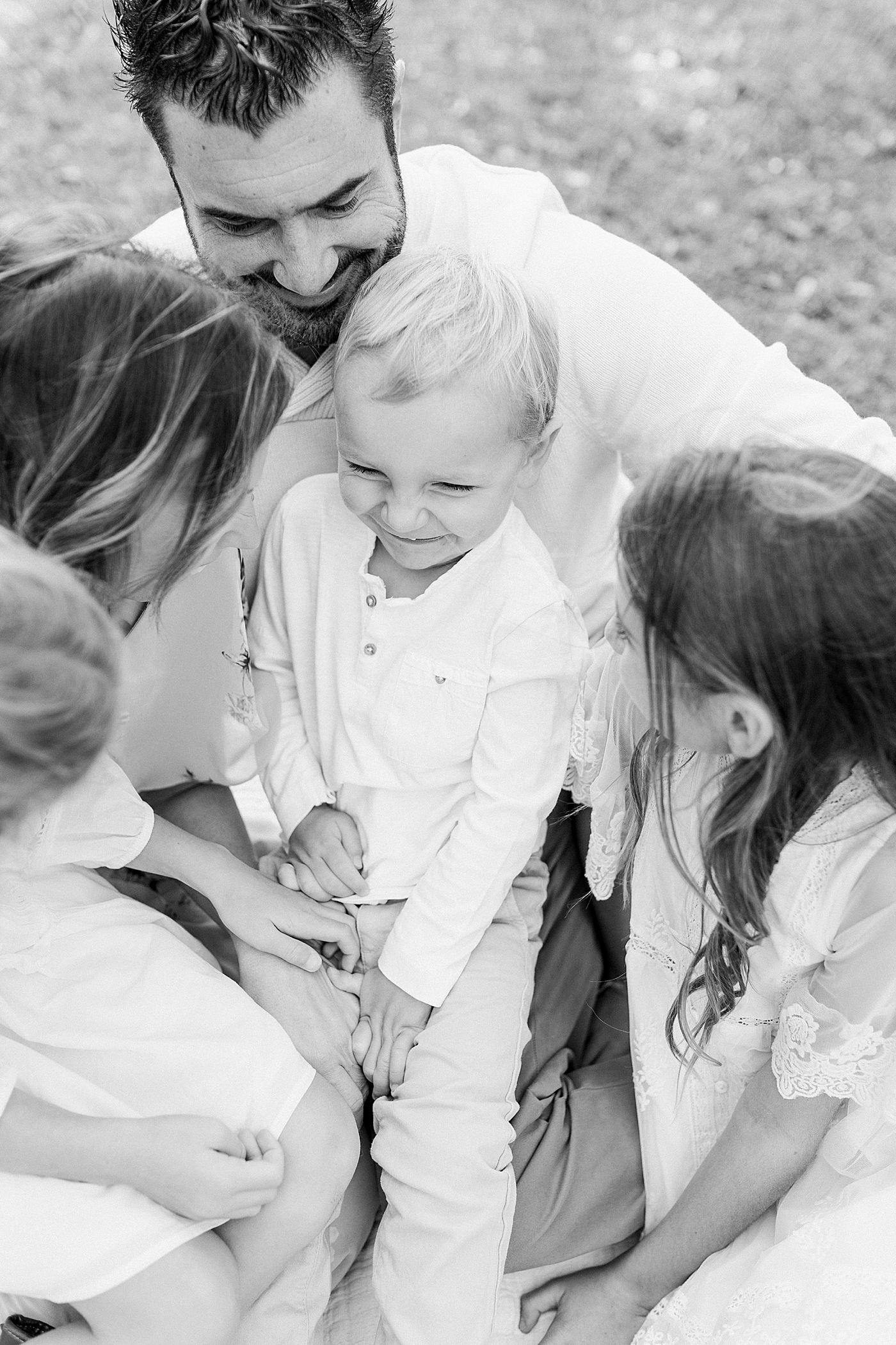 Black and white image of family of five | Photo by Caitlyn Motycka Photography