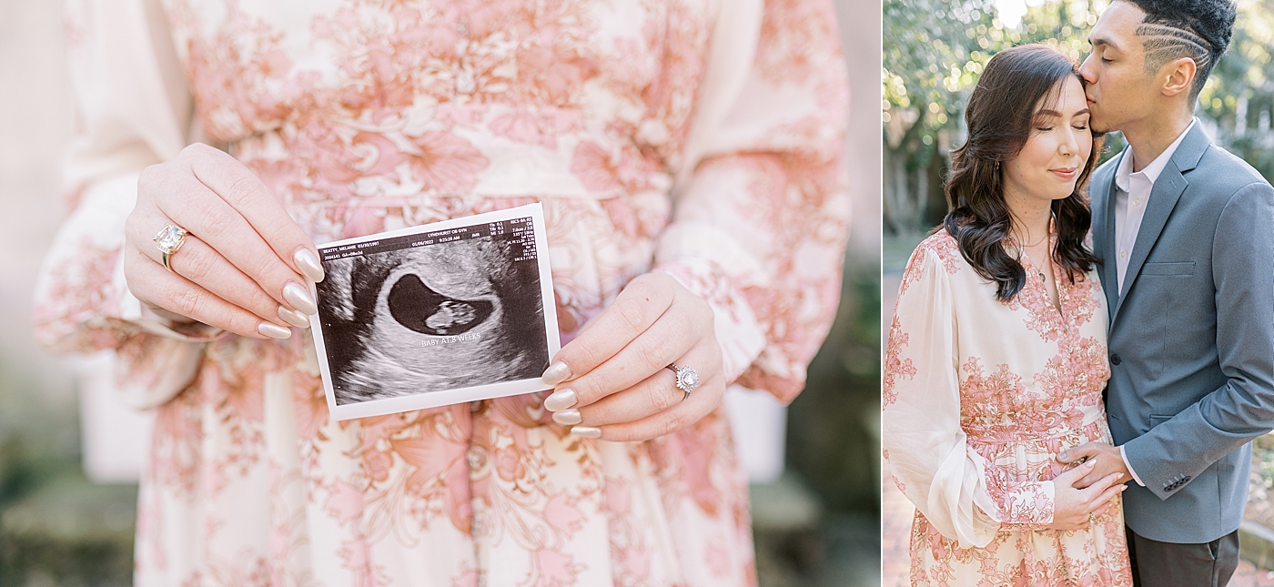 Mother to be in a pink floral dress holding an ultrasound image | Photo by Caitlyn Motycka Photography