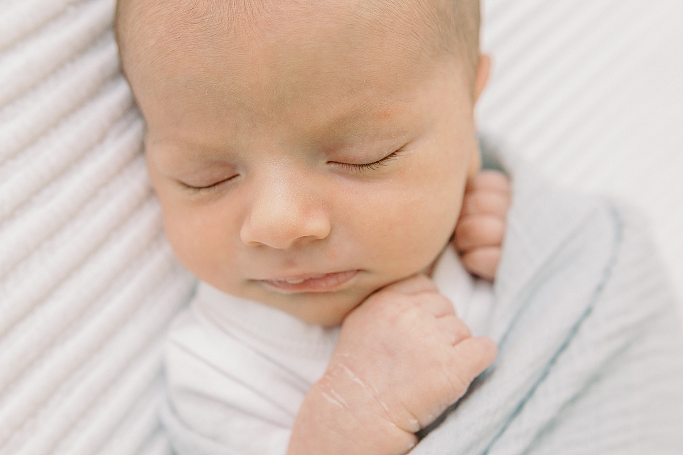 Detail of sleeping newborn baby's eyelashes | Image by Caitlyn Motycka