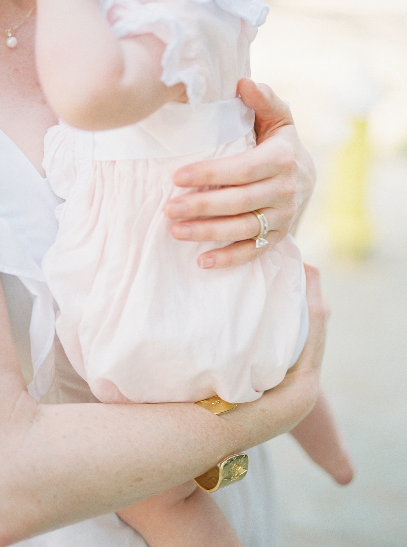Close up of a mother holding her baby | Image by Caitlyn Motycka
